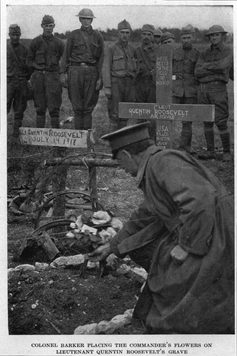 Colonel Barker placing the commander&rsquo;s flowers on Lieutenant Quentin Roosevelt&rsquo;s grave